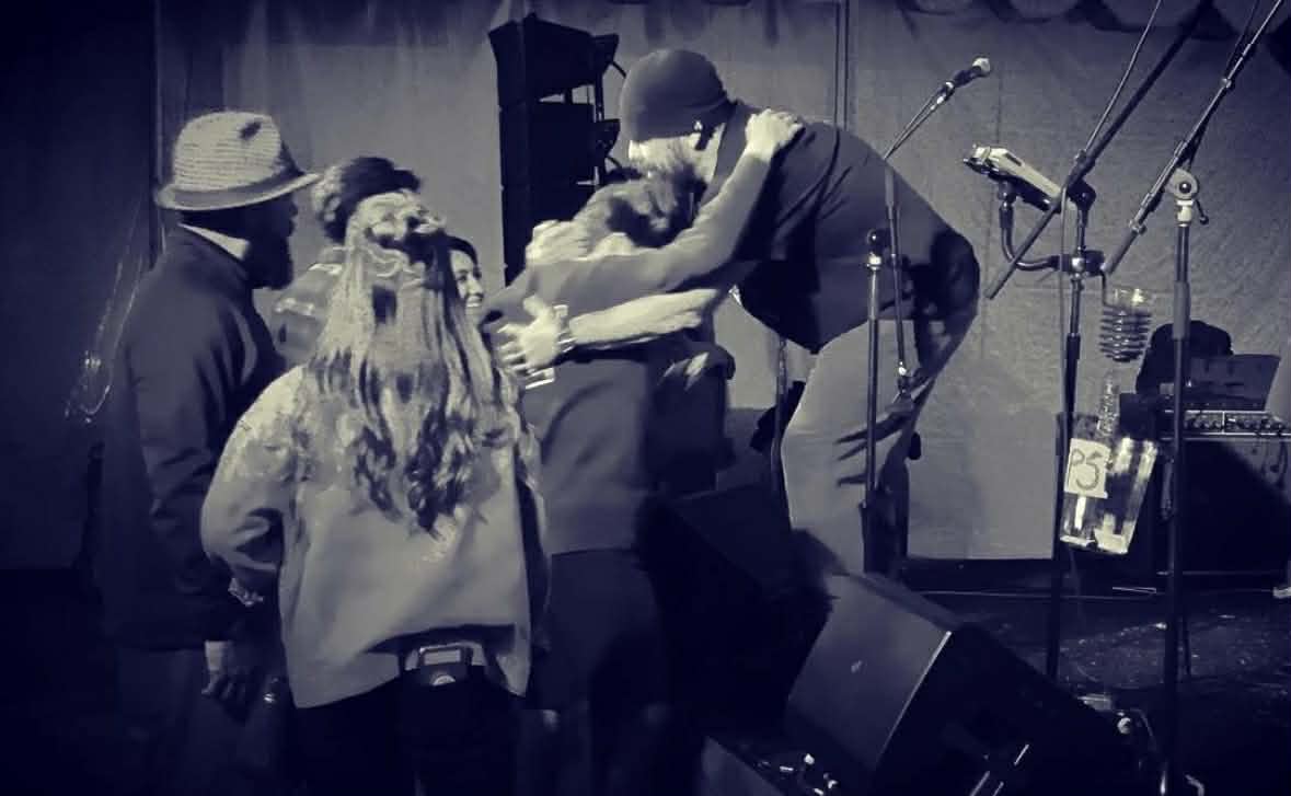 Mark Moffatt hugging fans after a Glorious Heydays show
