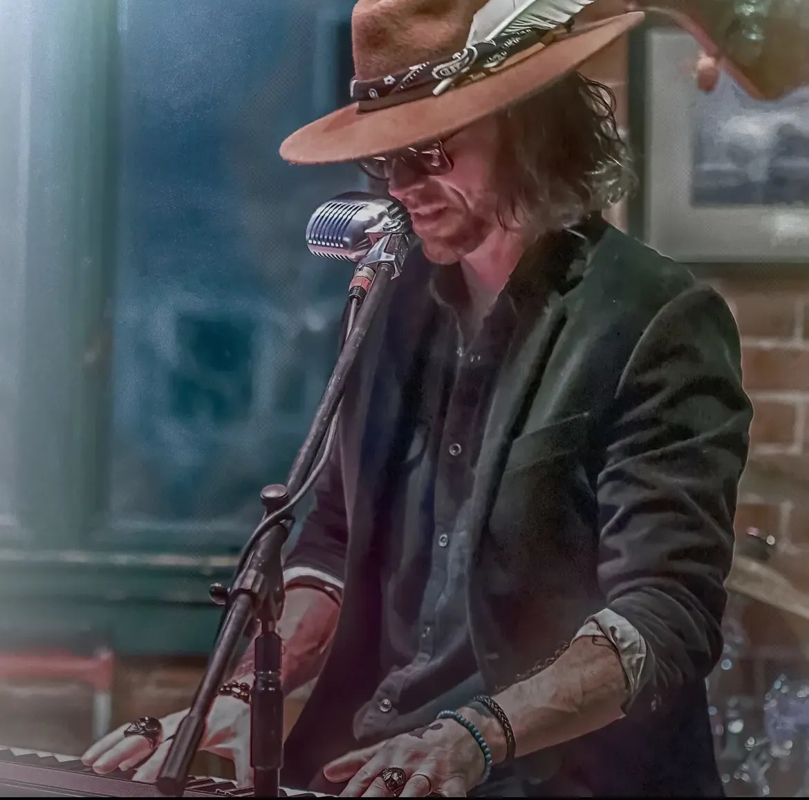 Jesse Weston on keys during a live Glorious Heydays show