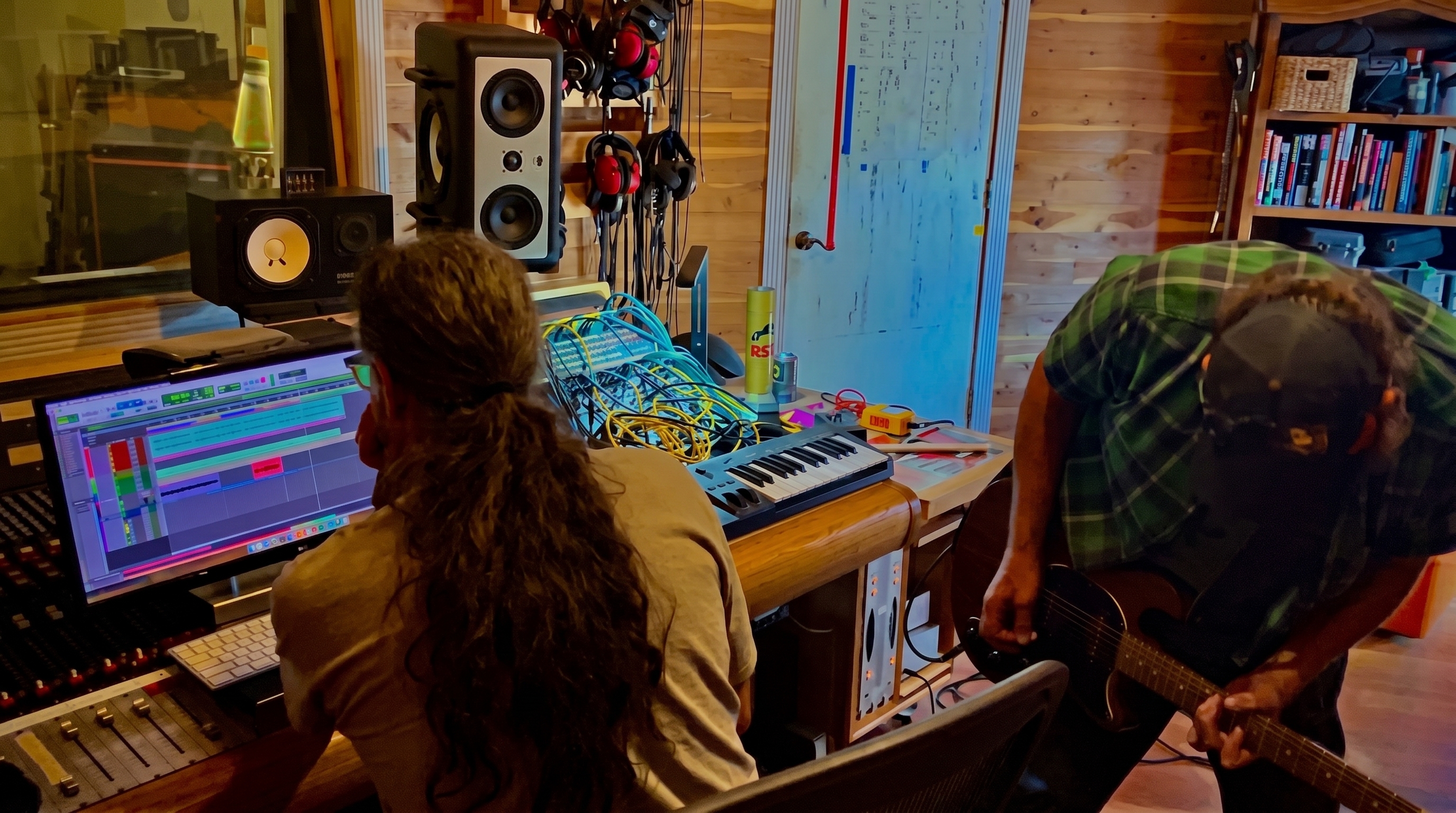Curtis Grippe at the mixing console with Steve Larson, recording the Glorious Heydays album